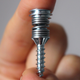 Image for article titled New Spring-Loaded Screw Turns Drywall Into Sound-Absorbing Panels